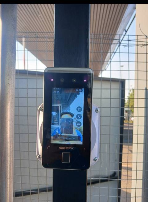 Facial recognition access control reader installed at an entrance